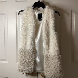 No sleeve sweater vest. Size XS. Super soft and great to wear over any shirt